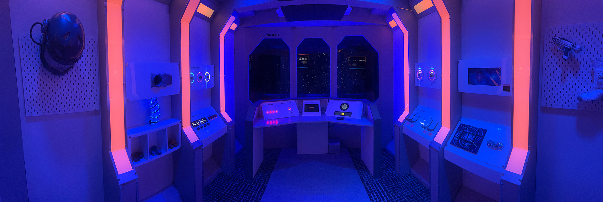 Interior view of spacecraft themed escape room.